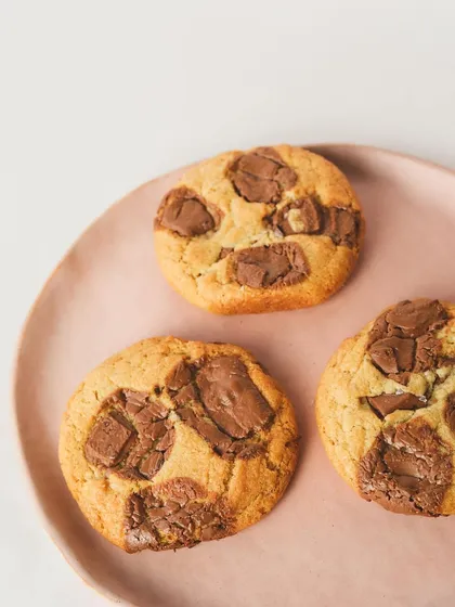 Crispy edges, soft centers, and all the chunks in between. These classic chocolate chunk cookies are a dream come true.
