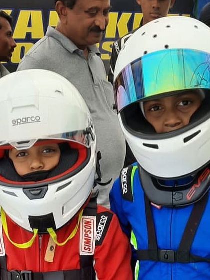 Two of our youngest drivers, ready to race. We are committed to starting them young and nurturing their talent from the very beginning.