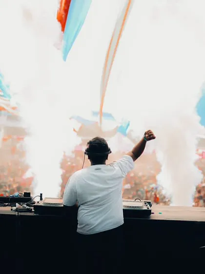 Performing for a massive crowd at a Holi festival. The energy of a daytime festival is different, but the goal is the same: make it an unforgettable party.