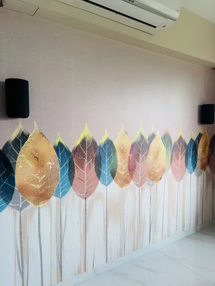 A beautiful leaf-patterned wallpaper design. I use accent walls like this to add personality and a unique artistic touch to a bedroom.