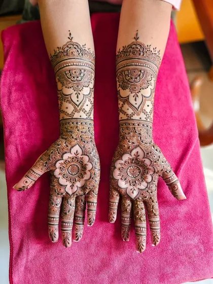 A full view of a design centered around beautiful mandalas on the palms.