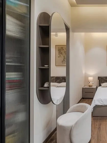 We love to challenge conventional design with unique, space-saving solutions. Our 'Halo' floating dressing table appears as a sleek, modern mirror, but reveals clever, hidden shelving from the side, offering an elegant and clutter free addition to your personal space.