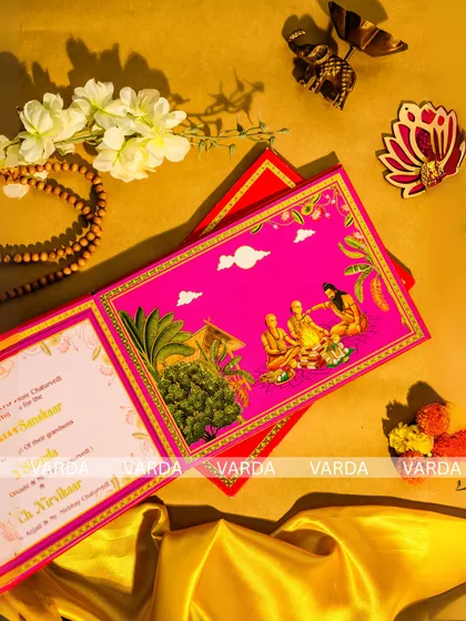 This vibrant Havan ceremony invitation captures the spiritual essence of a traditional Hindu wedding. The custom illustration, set against a bold pink, brings a modern feel to the sacred Vedic rituals, creating a beautiful and meaningful announcement.