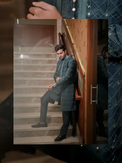 A creative, layered portrait of the groom against a staircase. This composition adds depth and a contemporary feel to a classic groom getting-ready shot.