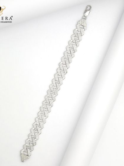 A substantial men's silver bracelet with a modern, woven-style link. This piece is designed for elegance and durability.