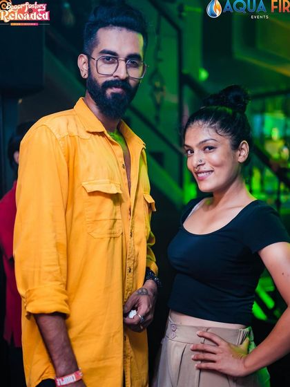 A couple posing for a photo.