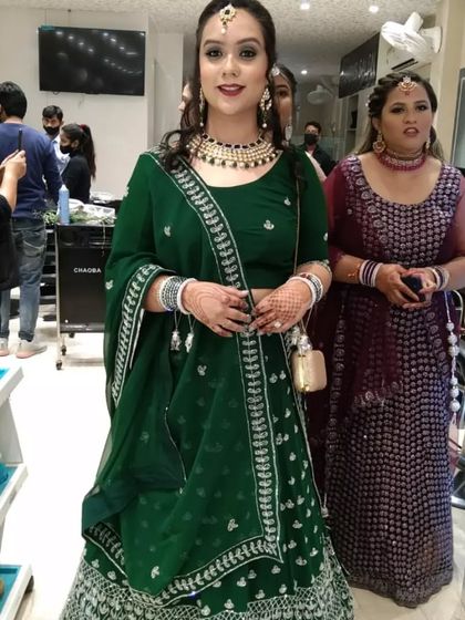 The complete look. This full-length view shows how the makeup, hair, and outfit all come together for a stunning final result for a wedding guest.