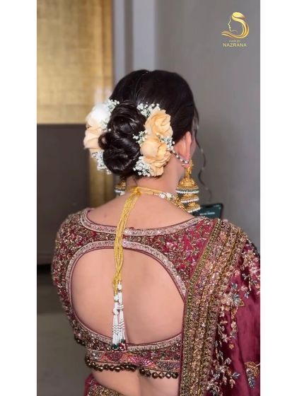 Another angle of the peach floral bun, showing its soft and romantic texture.