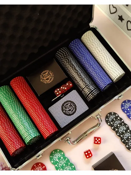 A closer look inside our personalized poker set, showing the organized chip trays and custom-branded playing cards.