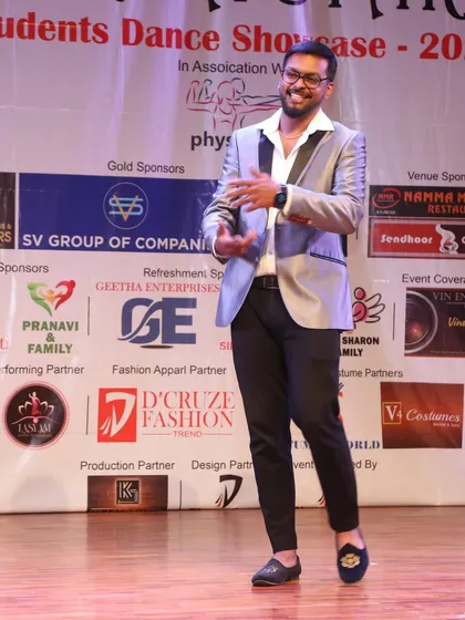 This is me, Alvin Bruno, on stage during our annual student showcase. I love hosting these events because they give every student a chance to shine and experience the thrill of a live performance, a core part of our teaching philosophy.
