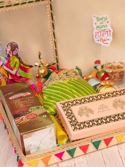 Holi is a festival of pure joy and color, and my hampers reflect that. This festive tray includes traditional thandai mix, organic gulal, and sweet treats, all arranged with playful details to make your celebration vibrant and special.