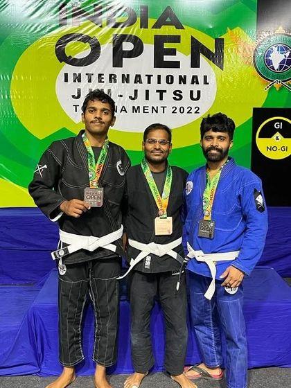 Pictures with friends and training partners at the SJJIF India Open tournament. We train together and support each other in competition.