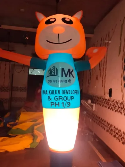 To make sure your advertising works day and night, I can add internal lights. This character air dancer for a developer has a built-in light that makes it glow after dark.