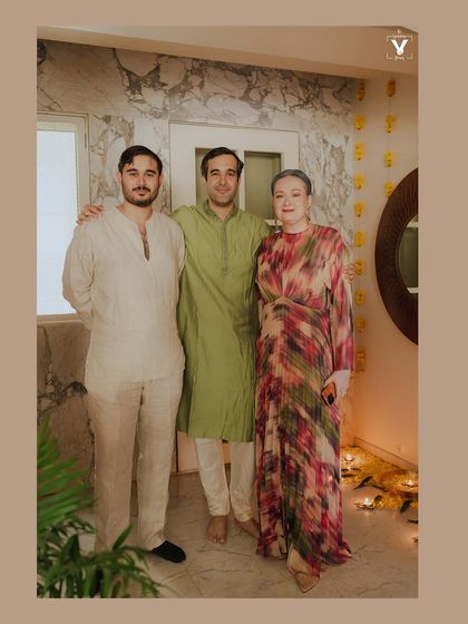 A warm family portrait, capturing three generations together in celebration. These are the memories that families will cherish for a lifetime.