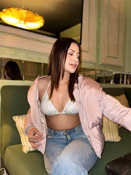 A different angle of the unique bikini top and jacket combination.