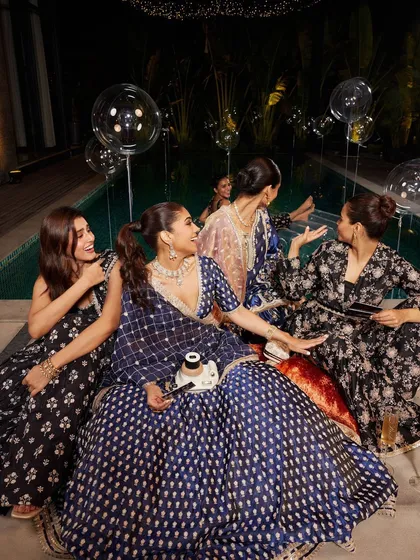 More behind the scenes fun with the bride squad by the pool. These are the candid moments you'll cherish forever.