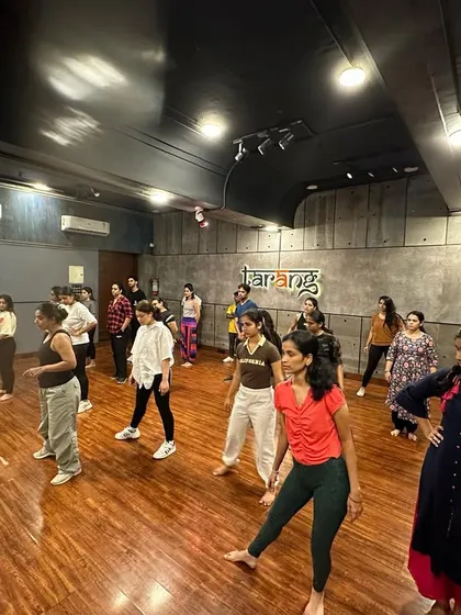 A wide shot of a regular Bollywood class at Tarang. You can see the diversity of students who come together to share their love for dance.