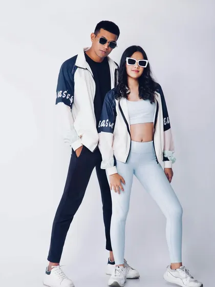 A stylish duo pose for an e-commerce catalogue. The clean white background and sharp lighting are standard for product listings that need to be clear and professional.