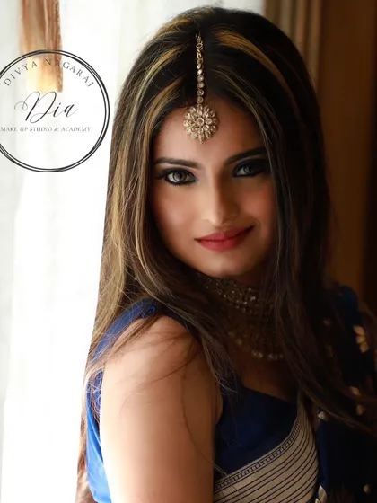 A direct look at this stunning blue smoky eye. Paired with a neutral lip, the eyes become the complete focus, making a powerful style statement.