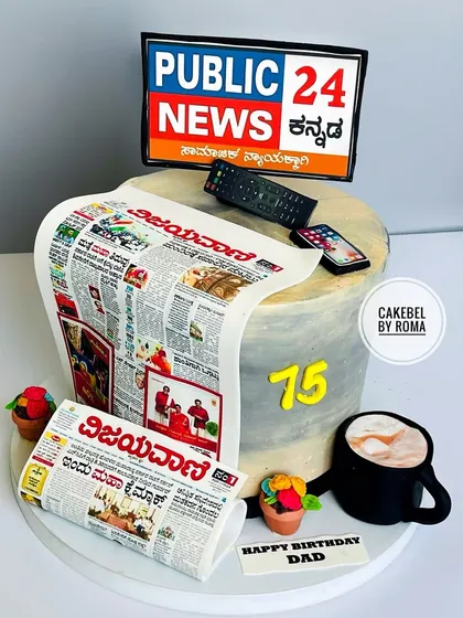 This cake was a special tribute for a dad celebrating his 75th birthday. I recreated his daily ritual: his favorite Kannada newspaper, the TV remote for the news, and a warm cup of coffee. It’s these personal stories that I love to tell.
