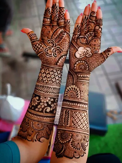This shot shows the full coverage of the design on the hands and forearms.