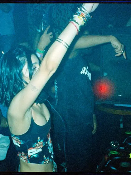 A duplicate of image 100, this film photo captures the raw, unfiltered energy of the dancefloor.