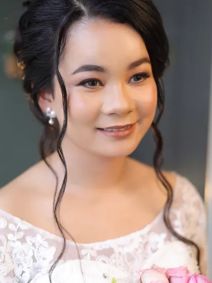 For my Catholic brides, I focus on creating a look of serene grace. This soft glam makeup enhances natural beauty with luminous skin and gentle hues, creating a timeless and angelic presence for your walk down the aisle.