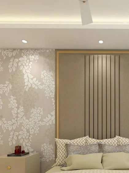 Another angle of the master bedroom, highlighting the combination of floral wallpaper and a beige upholstered headboard with fluted panel details. The design is a perfect blend of texture and pattern.