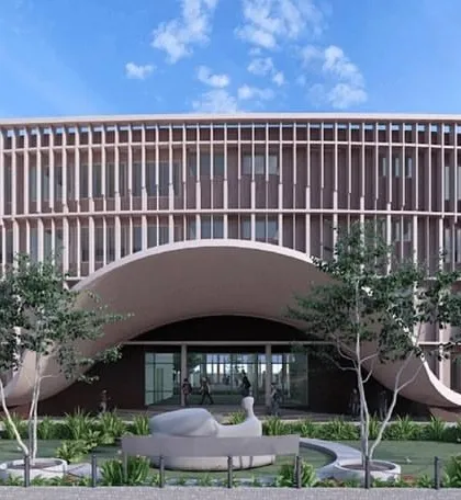 The facade of JAV Junior College in Bellary showcases our use of rhythmic vertical fins and a sweeping arched entrance. This design is not just aesthetically striking; it is a climate-responsive solution that modulates sunlight and creates a welcoming, modern identity for the institution.