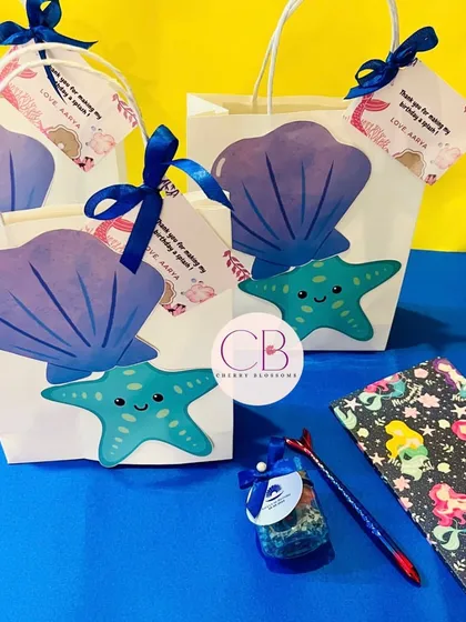 These mermaid-themed return favour bags were shipped to a client in Chennai. Each bag was filled with a mermaid-themed diary, a special pen, and a jar of our handmade ocean-themed chocolates.