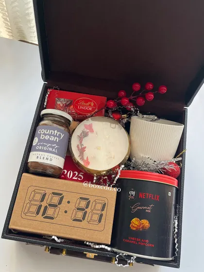 Another angle of the luxurious New Year trunk hamper, showcasing the rich collection of products designed to help recipients relax and set goals for the year ahead.