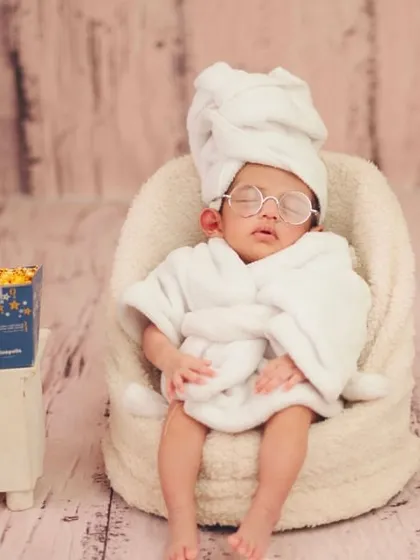 One of my favorite creative themes is the 'Infant Spa Day'. It's a playful and adorable way to capture your baby's personality. I ensure every prop is safe and comfortable for your little one.