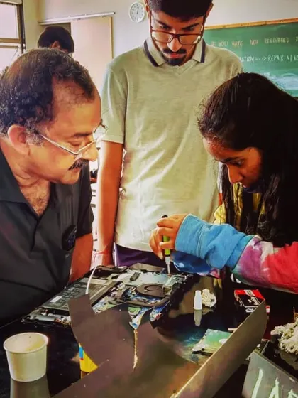 Here, one of our expert mentors guides a young learner through the process of troubleshooting a laptop. Our sessions focus on providing step by step guidance, ensuring every child understands the core concepts of gadget repair and maintenance.