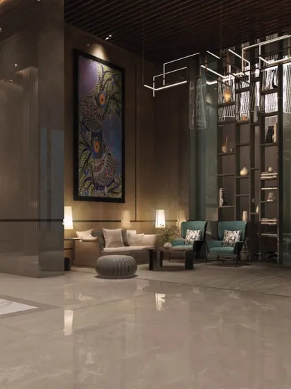 The lobby of One Marina is designed to be a work of art in itself. We used a dark, moody palette, dramatic lighting, and large-scale artwork to create a sophisticated and memorable entrance experience.