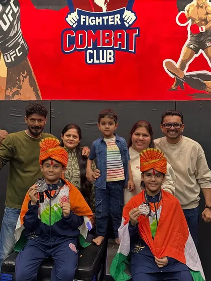 The families of our champions celebrating their return. We are a community that supports each other's children as our own.
