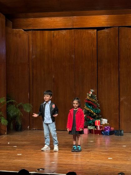 This dynamic duo commands the stage with their energy and expressive acting.