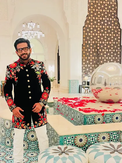 For a 'Shaam-E-Sufiyana', the look has to match the vibe. This custom-designed floral bandhgala is perfect for creating a sophisticated yet celebratory atmosphere for a night of soulful music and qawwali.