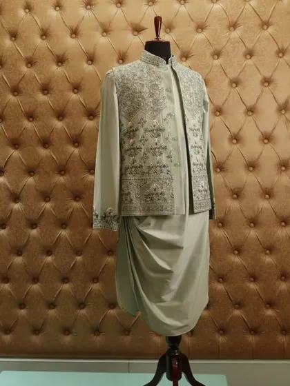 An attire that will look good on anyone. The subtle color and intricate embroidery make this a timeless and elegant choice.