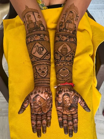 This design tells a complete story, with the doli scene on the arms and couple portraits on the palms. It's a beautiful way to capture the wedding journey.
