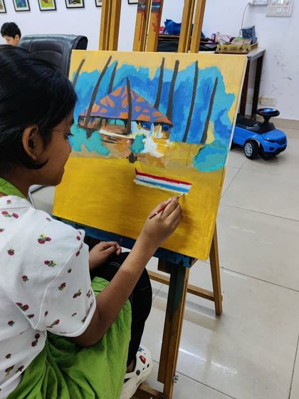 See how a student builds up a vibrant tropical beach scene, learning to paint palm trees, a hut, and the sandy shore.