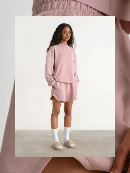 A clean, full-length shot for the launch of Antigravity's minimalist loungewear collection. The simple background keeps the focus entirely on the clothing.