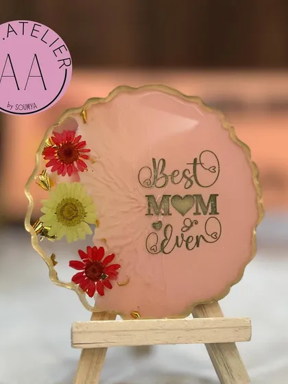 "Best Mom Ever" captured in a beautiful pink floral resin frame. These small frames come with an easel and are a heartfelt gift for Mother's Day or her birthday.