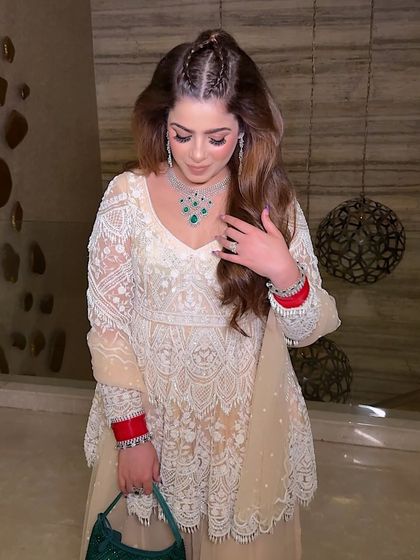 A beautiful, soft glam look for a traditional event. The makeup is clean and fresh, with a focus on glowing skin and softly defined eyes.