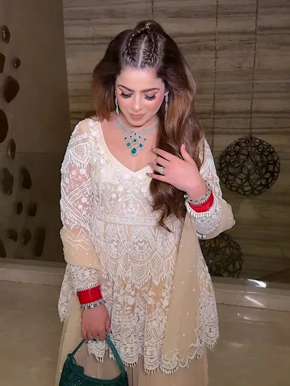 A beautiful, soft glam look for a traditional event. The makeup is clean and fresh, with a focus on glowing skin and softly defined eyes.