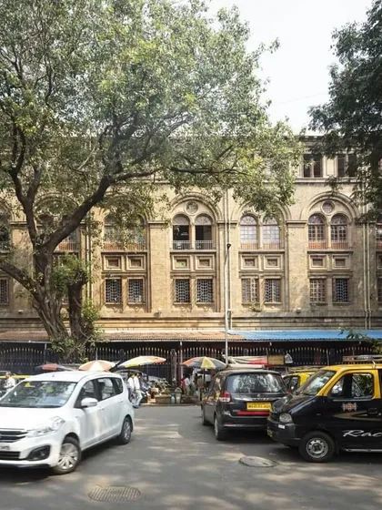 The current state of Ballard Estate. This photo shows the beautiful neo-classical architecture designed by George Wittet, but also the dominance of cars and the lack of accessible public space, which our project aims to address.