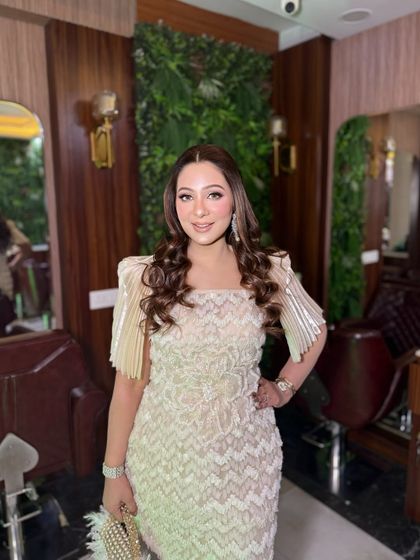 This beautiful client wanted a soft day glam look, and we were happy to deliver. The makeup is light and radiant, perfect for her elegant dress.