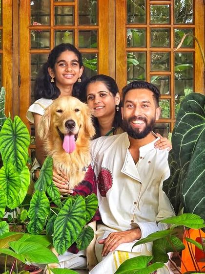 The complete family, including our dog Leo. Our home is full of life, both human, animal, and plant.