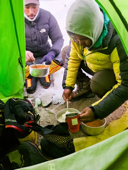 Expedition life is about finding comfort in the basics. A warm meal of dal and chawal inside a tent at a high-altitude camp on Kang Yatse is more satisfying than any feast. It's these simple, shared moments that define the journey.