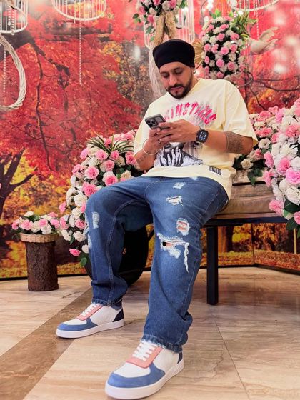 Taking a quick break amidst the beautiful floral decor before the guests arrive for a Friday night reception.