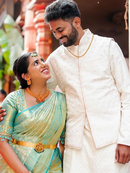 The way they look at each other says it all. This is a classic, happy portrait from a South Indian engagement, filled with warmth and anticipation.